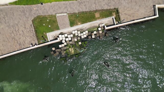 Aerial drone view of the Monument to the Partisan Woman in Venice, Italy.