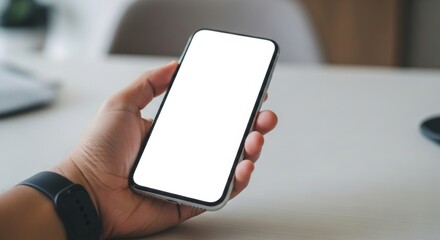 Businessman showing modern smartphone with empty screen demonstrating mobile app promotion and digital marketing potential in the online world now