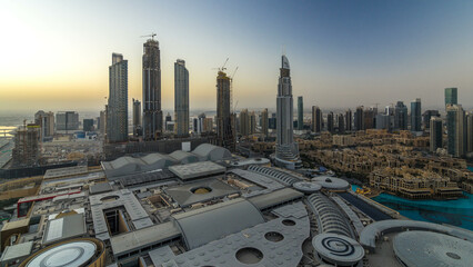 Obraz premium Dubai downtown night to day timelapse. Top view from above