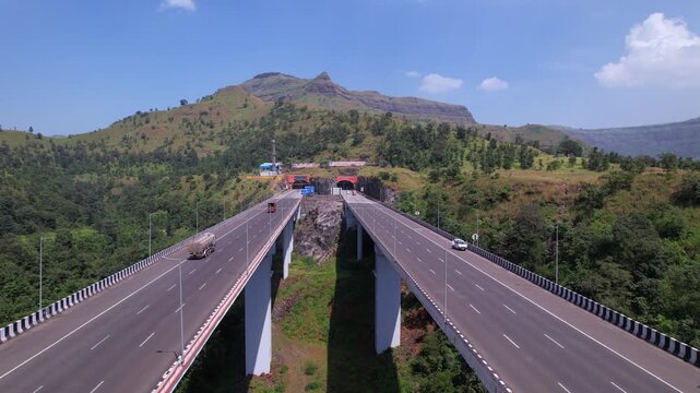 Igatpuri tunnel on Mumbai Nagpur expressway through western ghats forest landscape, Maharashtra, Aerial