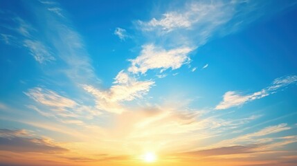 Obraz premium Sunset or sunrise sky background with thick, fluffy clouds in varying shades of blue, gray and white