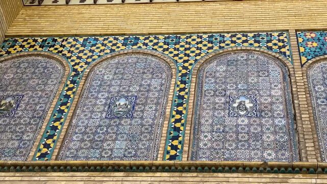 Persian arcade blue tile to decorate wall in stylish vibrant traditional architecture mosaic floral pattern ceramic art arabesque design turquoise dome vintage decor brick texture peaceful Tehran Iran