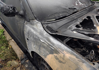 Completely Burnt Out Car Wreck After Fire.