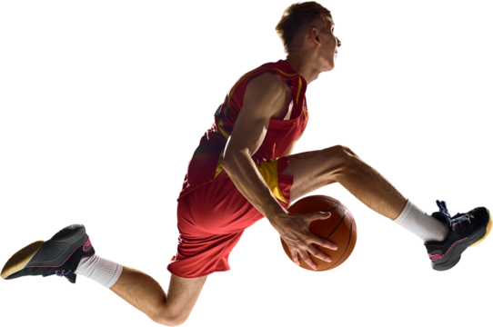 Basketball player mid air holding ball showing motion control and strength. Concept of athletic energy, victory ambition, and human power captured in peak performance motion. Transparent background