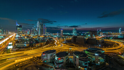 Dubai Media City with Modern buildings aerial day to night timelapse, United Arab Emirates