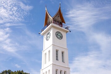 Fototapeta premium A clock tower called Jam Gadang, a tourist attraction in the city of Bukittinggi, West Sumatra, Indonesia