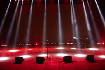 A spotlight on an empty stage.