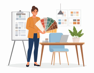 A young woman stands in a modern office presenting a color palette with a laptop and design materials nearby on a clean white background.