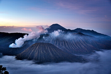 Mystical dawn over smoking Mount Bromo