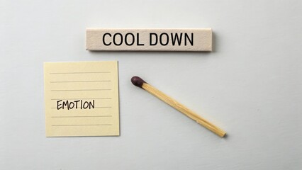 Matchstick and notes suggesting cooling down an emotion