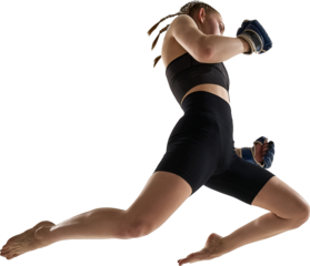 Female fighter jumping in air throwing forward punch wearing blue gloves. Concept of agility, empowerment, energy, sports motivation, and strength in motion. Transparent background