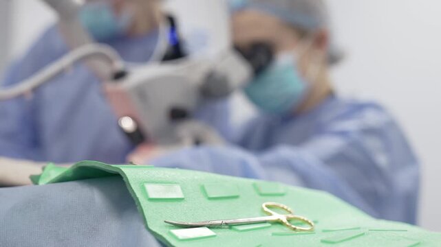 A surgeon performs tympanoplasty surgery on a patient to help him hear