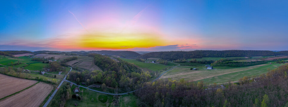 Aerial landscape of corn fields farmland mountains sunset rural Appalachia Central Pennsylvania