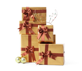 Christmas gifts with baubles and antlers headband on white background