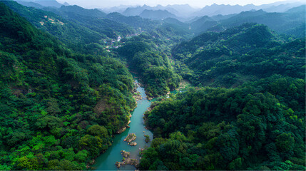 Enshi City Hubei Province green forest river view from above.