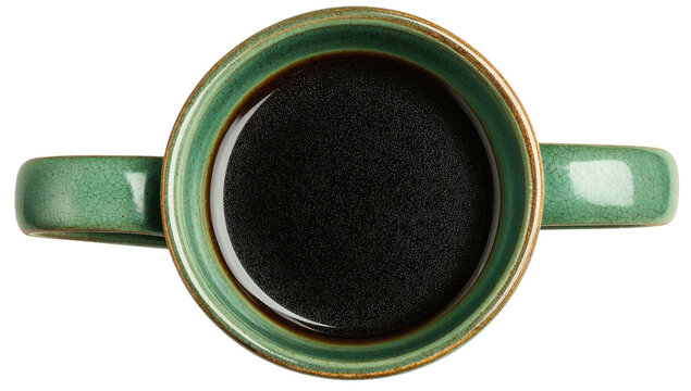 Overhead view of a turquoise ceramic mug filled with dark, freshly brewed coffee