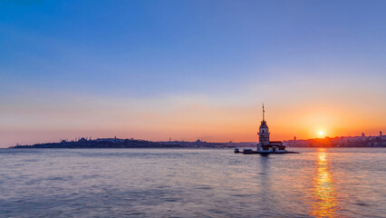 Fototapeta premium Maidens tower before sunset timelapse in istanbul, turkey, kiz kulesi tower