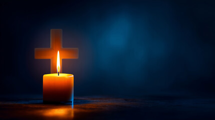 burning church candle in front of a wooden background isolated over elegant, minimalistic navy blue empty interior; all saints day concept