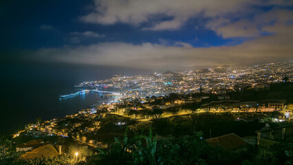 Island landscape after sunset panoramic view to Funchal, Madeira, Portugal timelapse