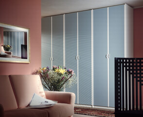 Single shot photo of a room with a wardrobe