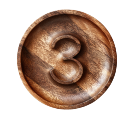 Wooden number "3" crafted within a circular plate against a stark black backdrop