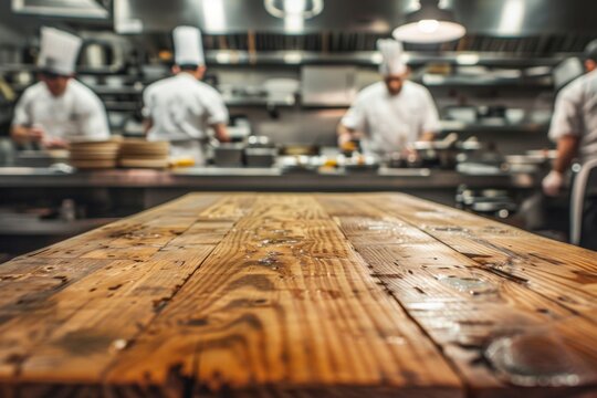 Chefs preparing food in a busy kitchen