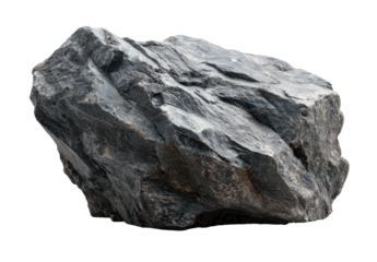 A close-up of a rough, angular, gray rock with textures and shadows, isolated against a black backdrop