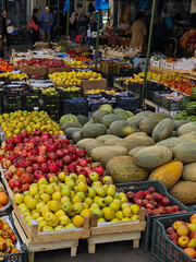 Fruit stand with assorted fresh produce at local market