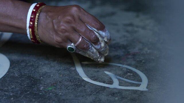 bengali alpona drawing on floor by human \bengali culture 