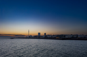Sunset behind the skyline of Brighton, East Sussex, England.