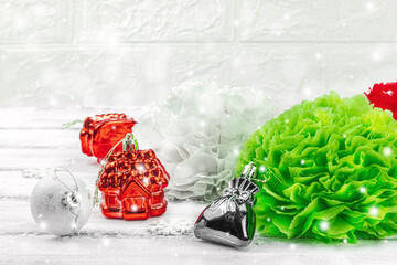 Traditional New Year composition. Festive decor, handmade paper flowers, gift idea. Holiday time