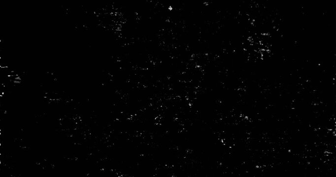Grunge black and white texture with scattered white specks and distressed film grain effect