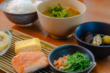 Japanese breakfast with grilled salmon and miso soup
