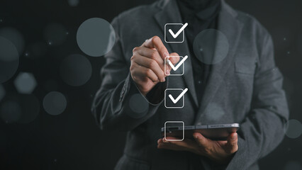 Businesswoman tick correct sign mark for document approve, project acceptance and quality assurance concept, take an assessment, questionnaire, evaluation, online survey, online exam, checklist.