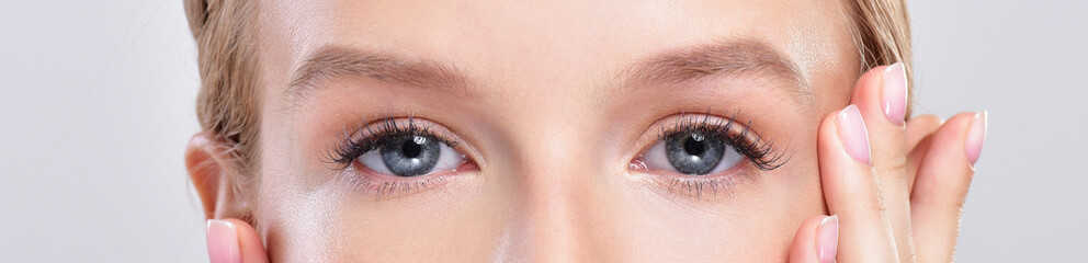 Obraz premium Closeup shot of woman eye with day makeup. Long eyelashes