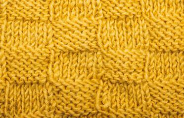 Detail of woven handicraft knit woolen design texture.