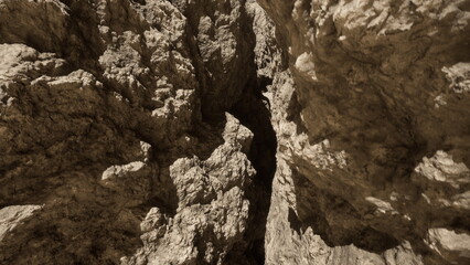 A breathtaking view of rugged cliffs showcases intricate textures and shadows created by sunlight hitting the rock surfaces. Natures artistry is on full display in this natural wonder.