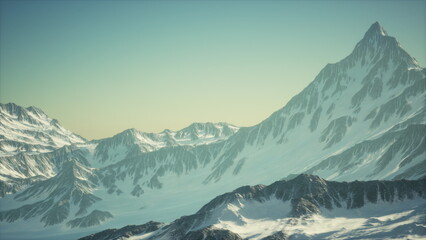 Snow capped peaks stand tall against the horizon as sunlight begins to warm the rugged terrain. A sense of peace fills the air, inviting outdoor explorers to witness natures beauty.