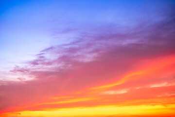 Fototapeta premium Beautiful , luxury soft gradient orange gold clouds and sunlight on the blue sky perfect for the background, take in evening,Twilight, Large size, high definition landscape photo