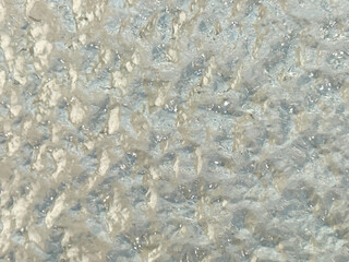 Pastel abstract background with rough glass texture