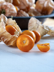 Fresh Golden Berries with Husk on Light Background