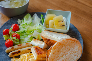Western breakfast with bread and scrambled eggs
