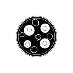 A circular black and white illustration of a dish featuring various food items on a plate