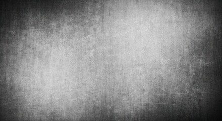 Abstract grainy textured background in grayscale with vignette effect, dirty looking