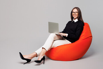 Full body young smart employee IT business woman corporate lawyer wear black clothes glasses work...