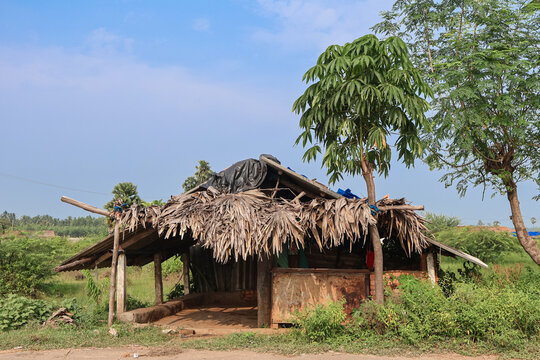 Indian farmer house in a rural agricultural village. Traditional Indian style hut or village house.