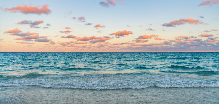 Sunrise with sea beach. Dramatic sunrise horizon at sea. Romantic summer vacation on sunset seascape. Sea sunset on ocean. Sunset seascape at summer vacation. Serene horizon