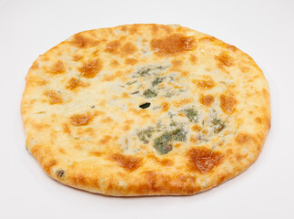 Georgian Khachapuri Pkhlovana With Herbs and Melted Cheese On White Surface