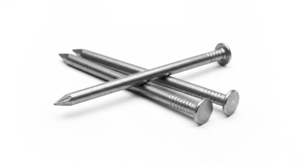 Three silver nails, arranged overlapping, isolated on a white background
