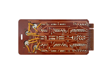 Old vintage electronic circuit board with wires and soldering is isolated.